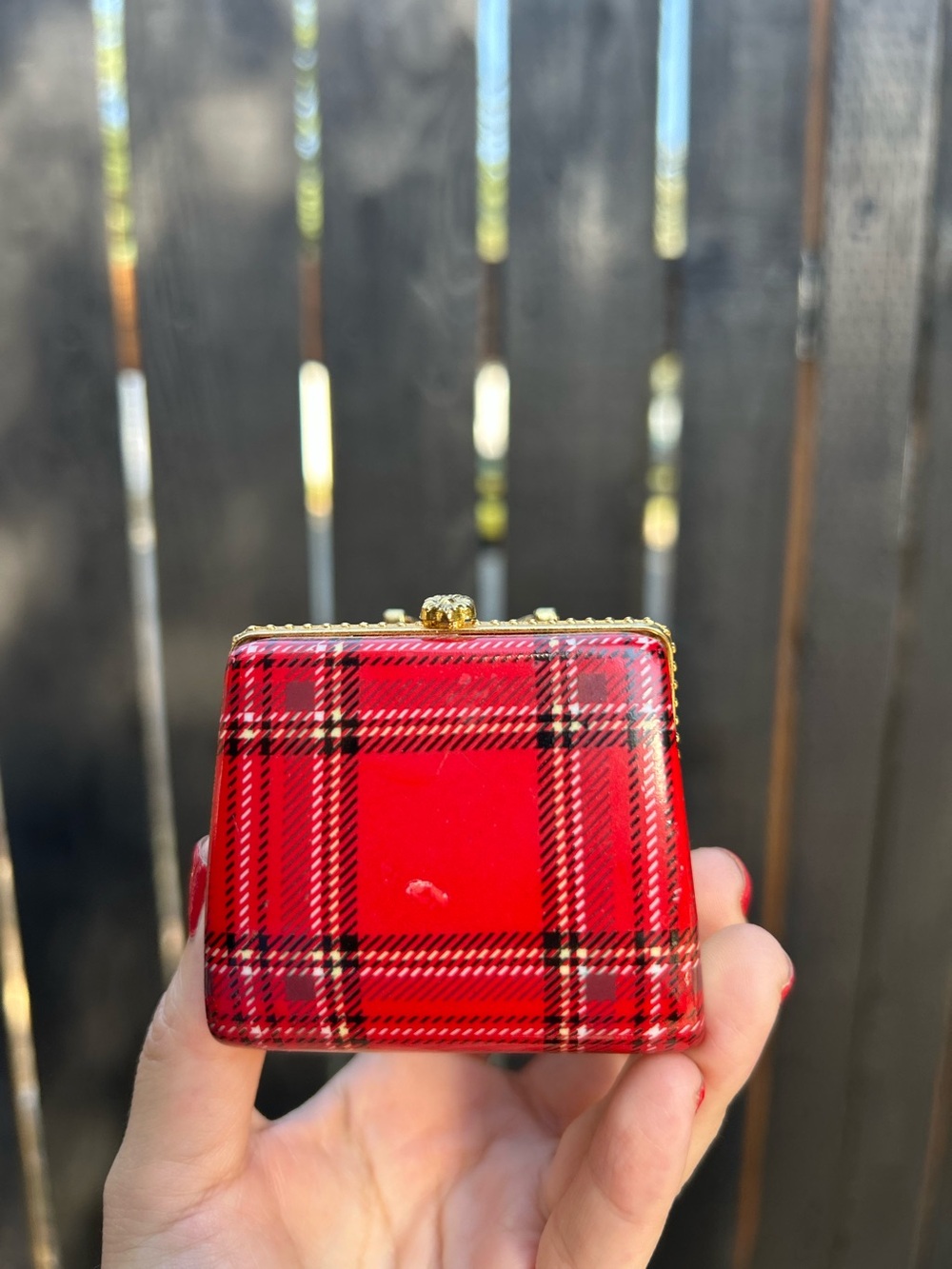 vintage porcelain trinket box is shaped like a red plaid purse